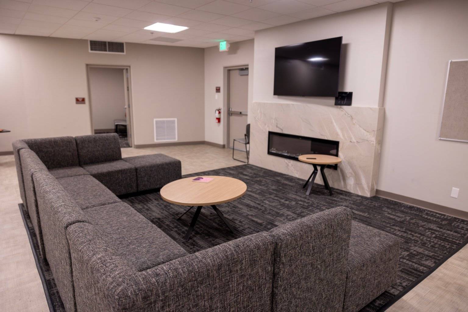 a room with a couch and a tv