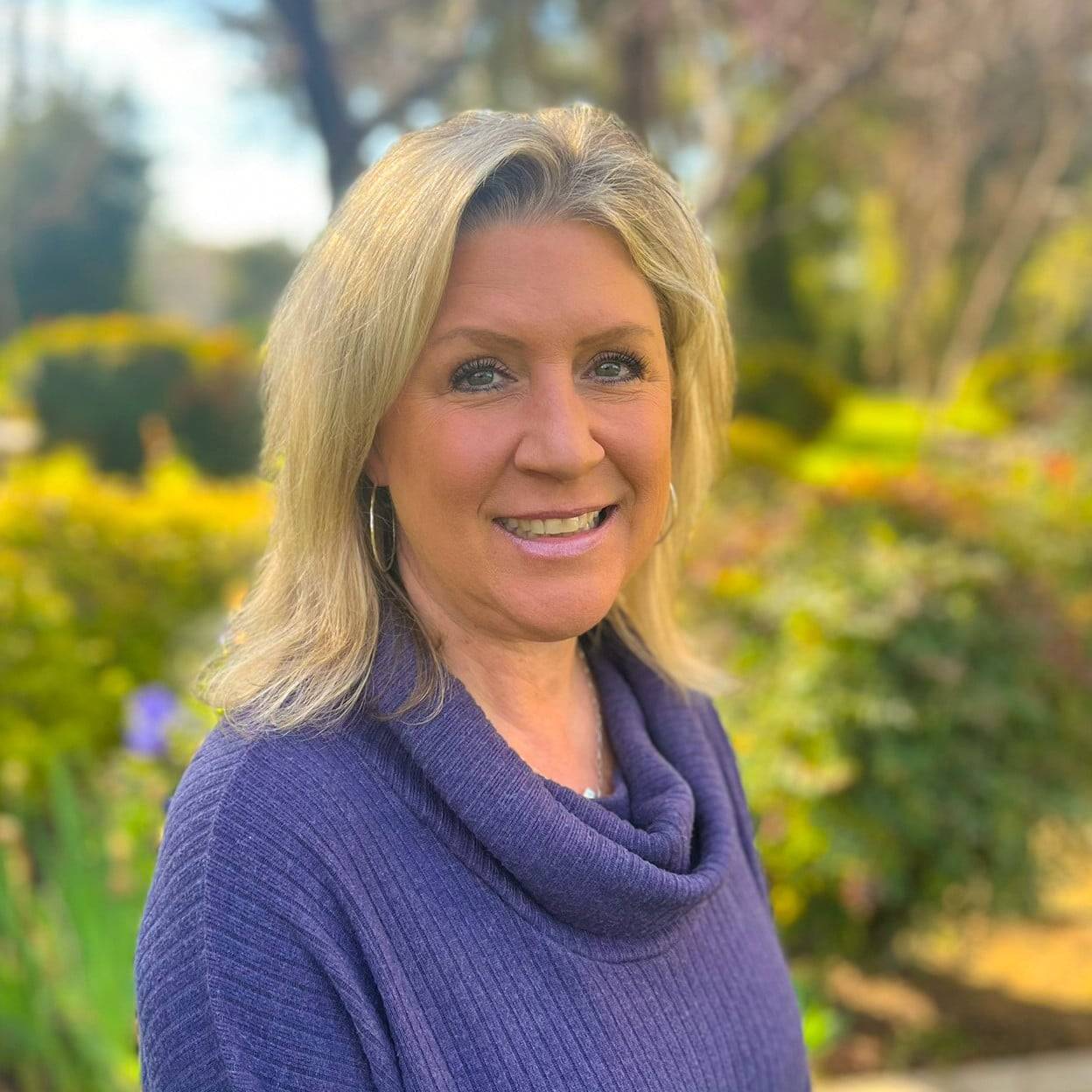 a person smiling at camera
