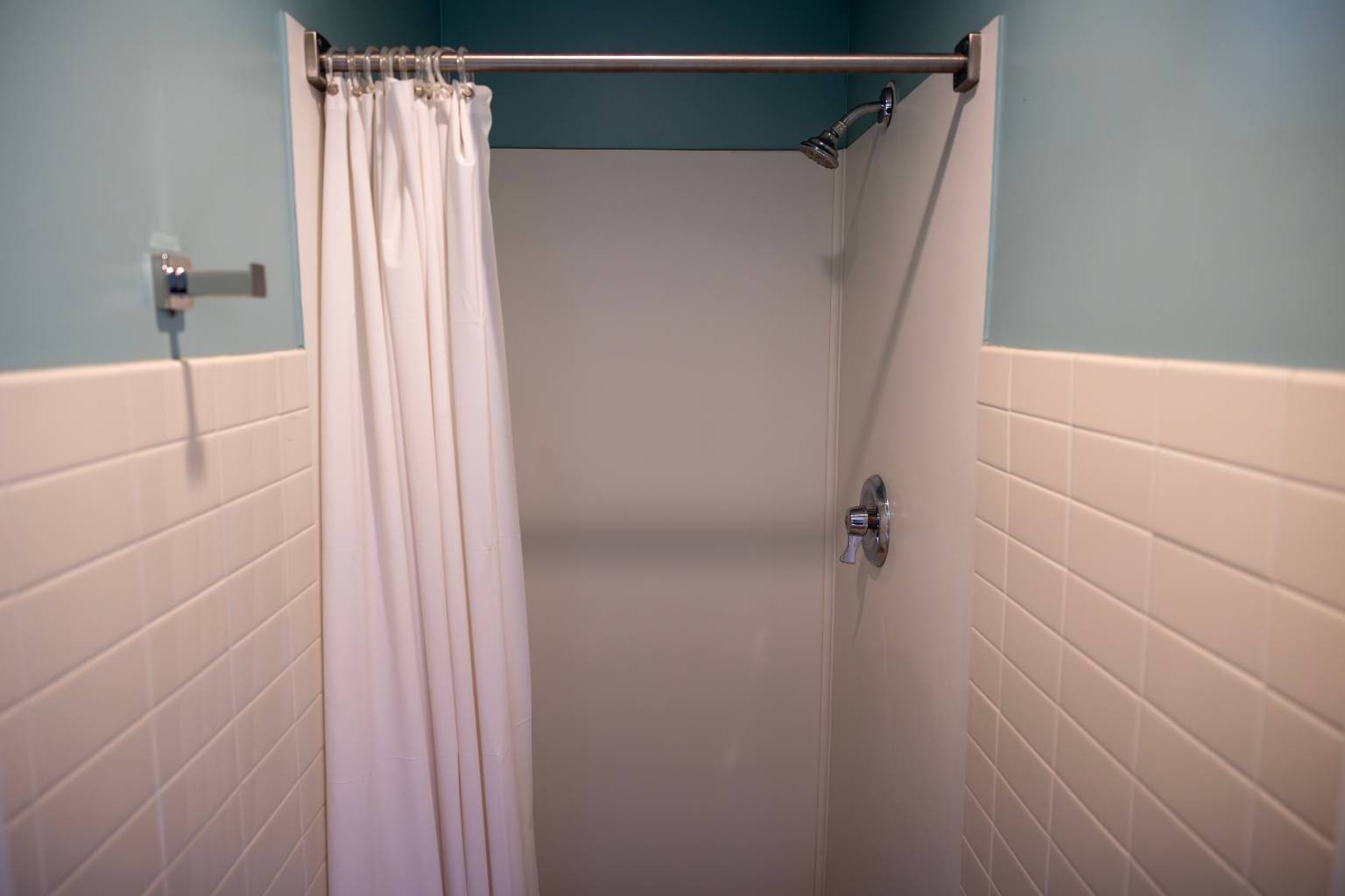 a shower curtain in a bathroom
