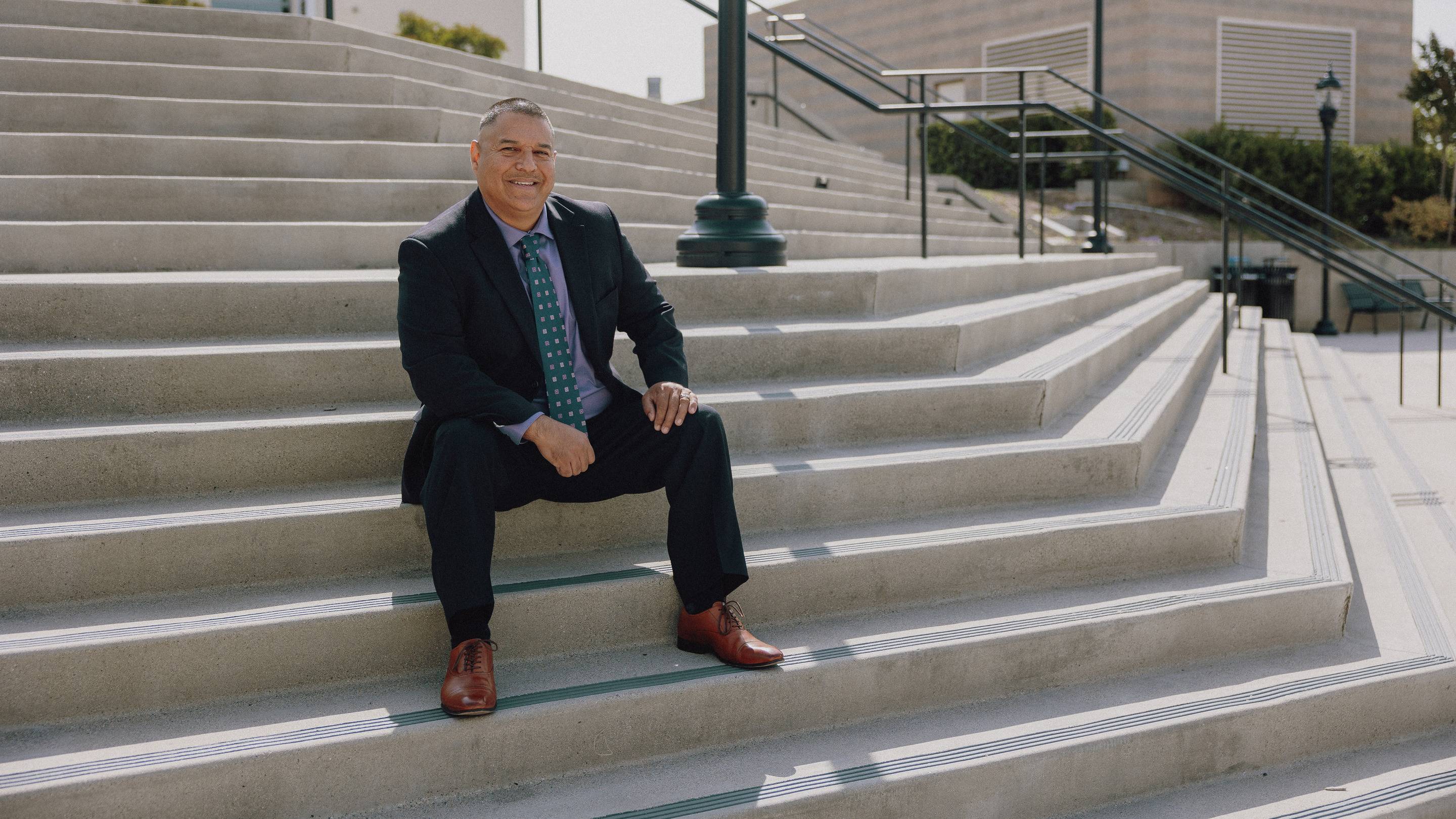 a person sitting on stairs