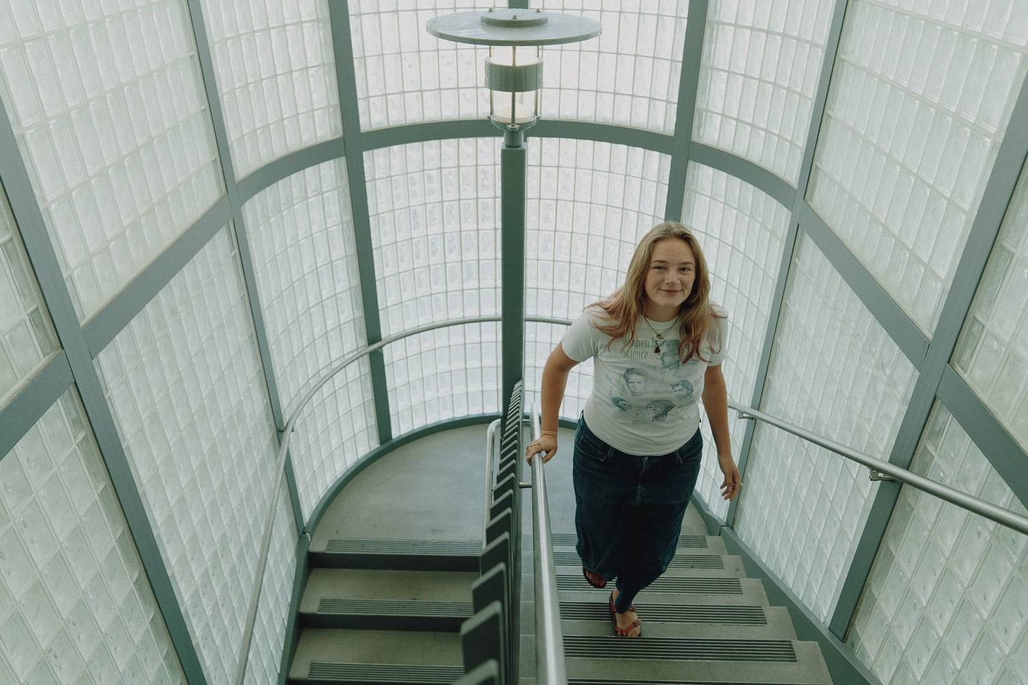 a person walking up a staircase