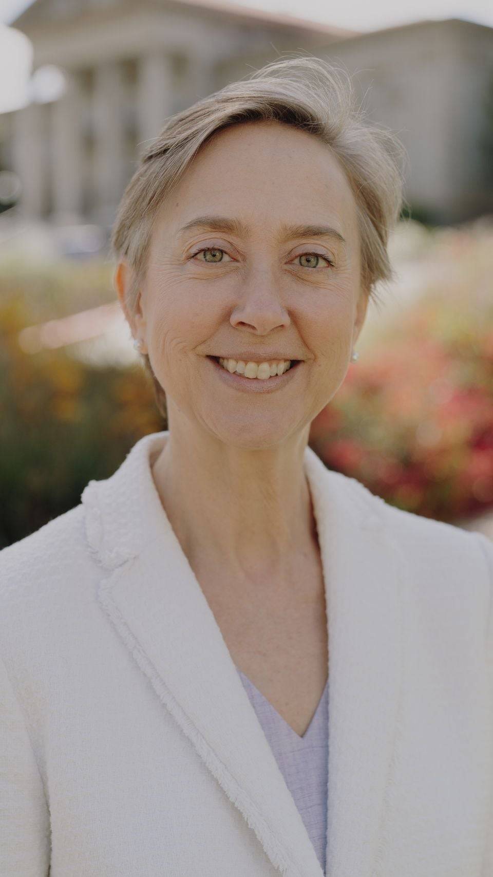 a person smiling for a picture