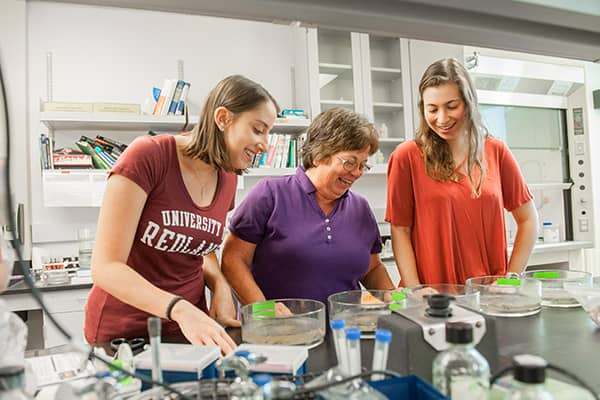 a group of women in a lab