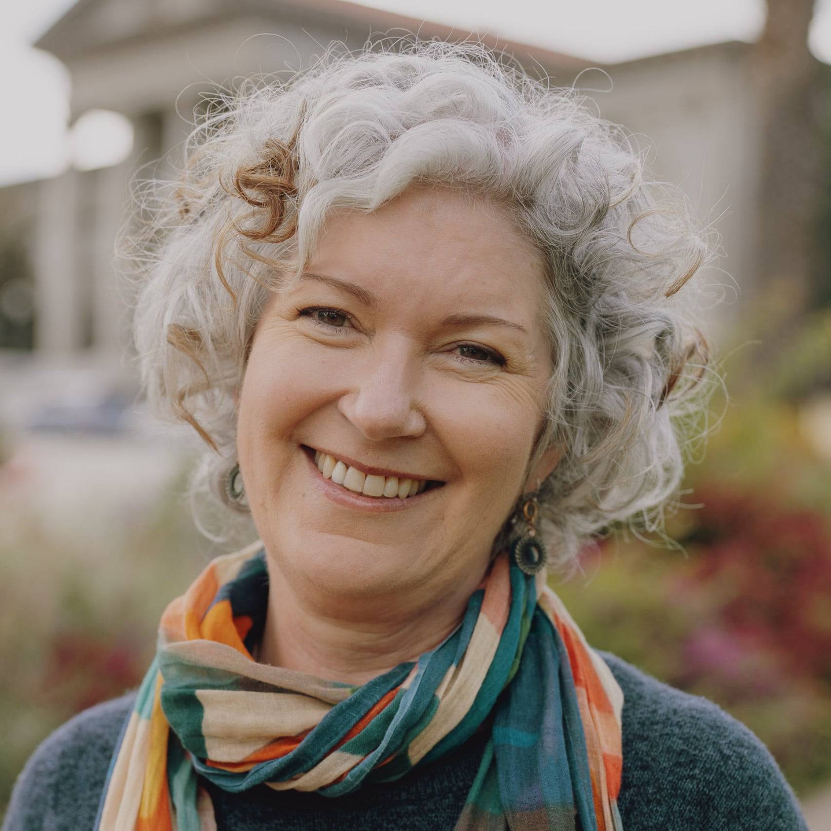a person smiling at the camera
