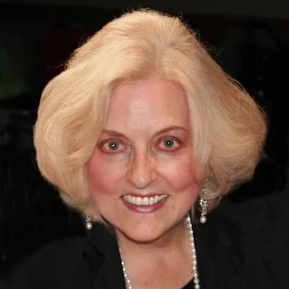 a person smiling at camera