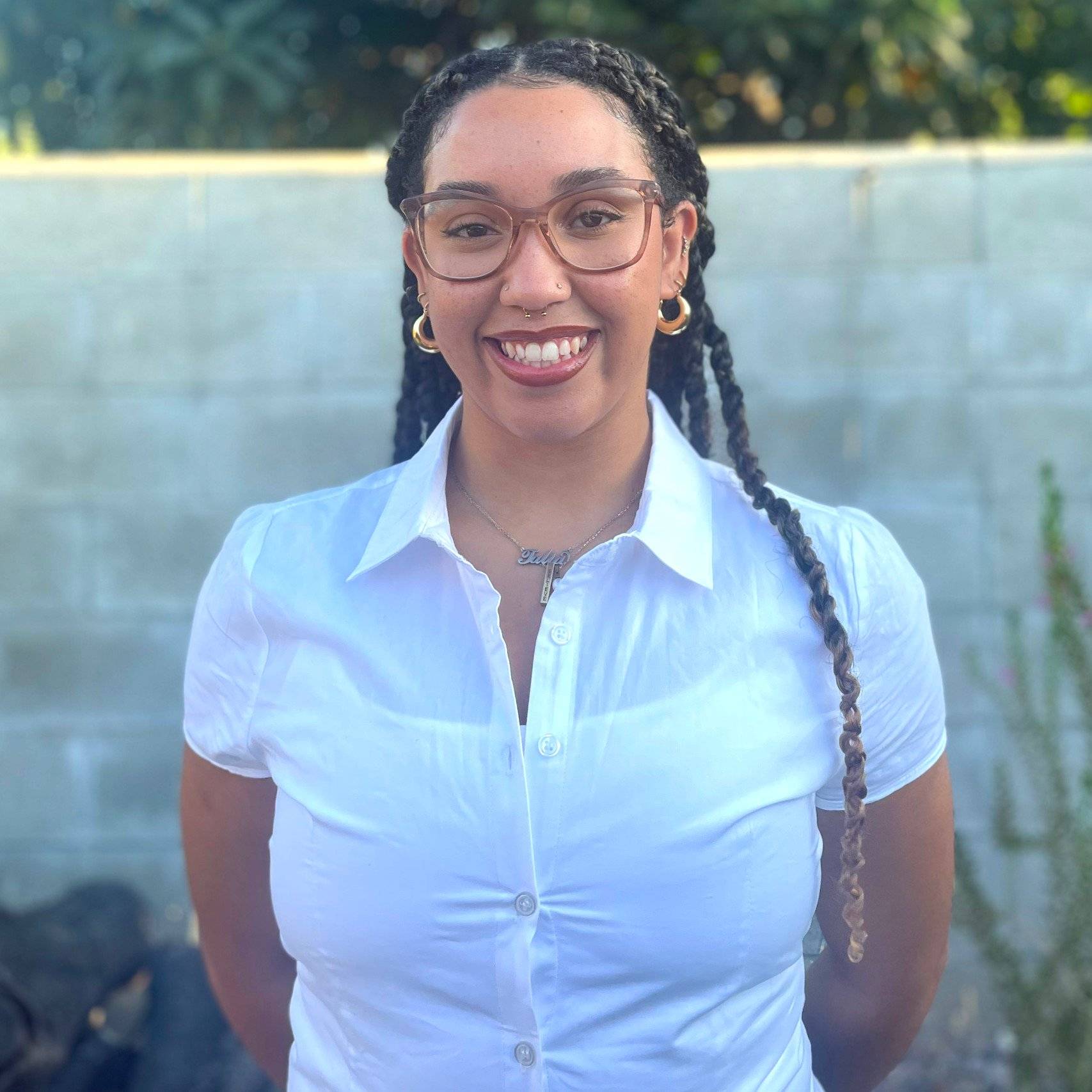 a person smiling at camera