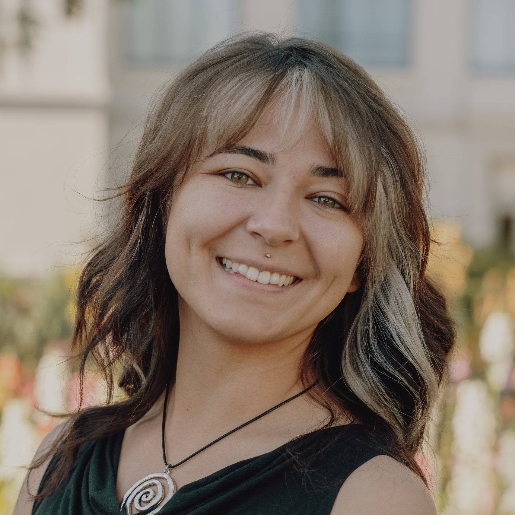 a person smiling at camera