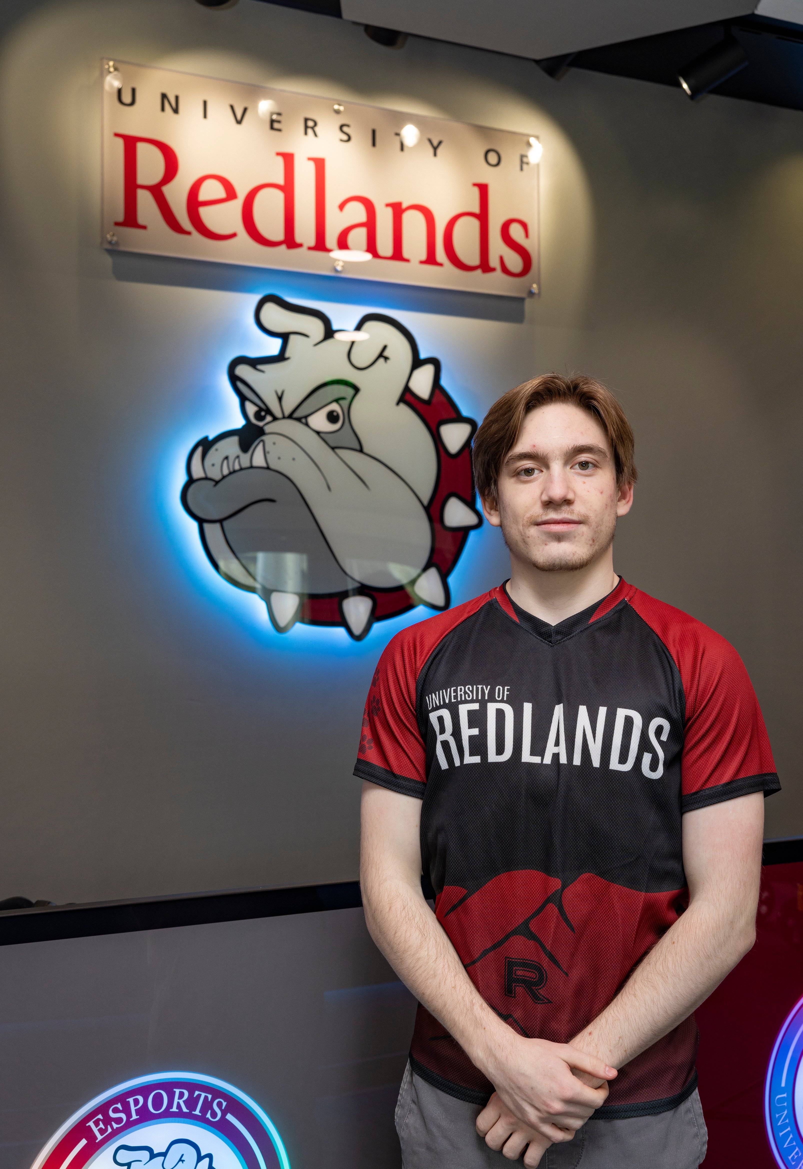 a person standing in front of a sign