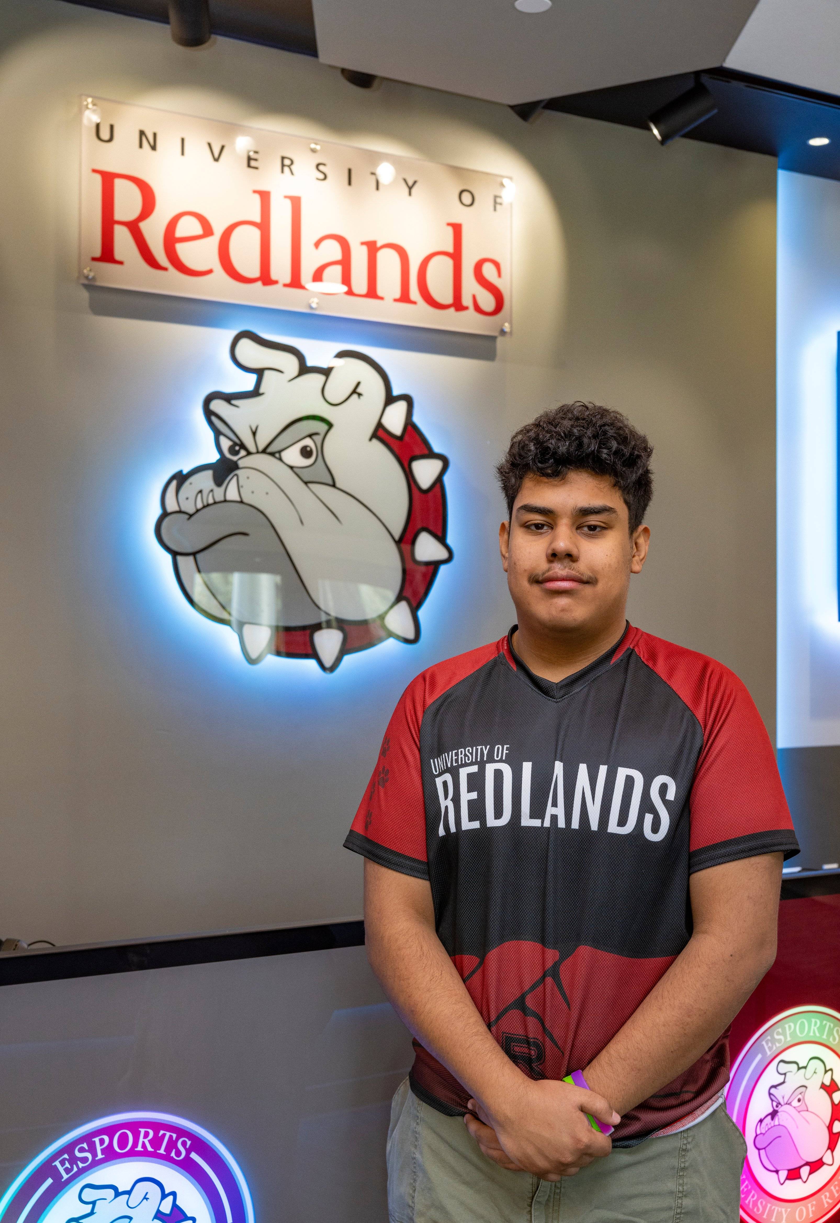 a person standing in front of a sign