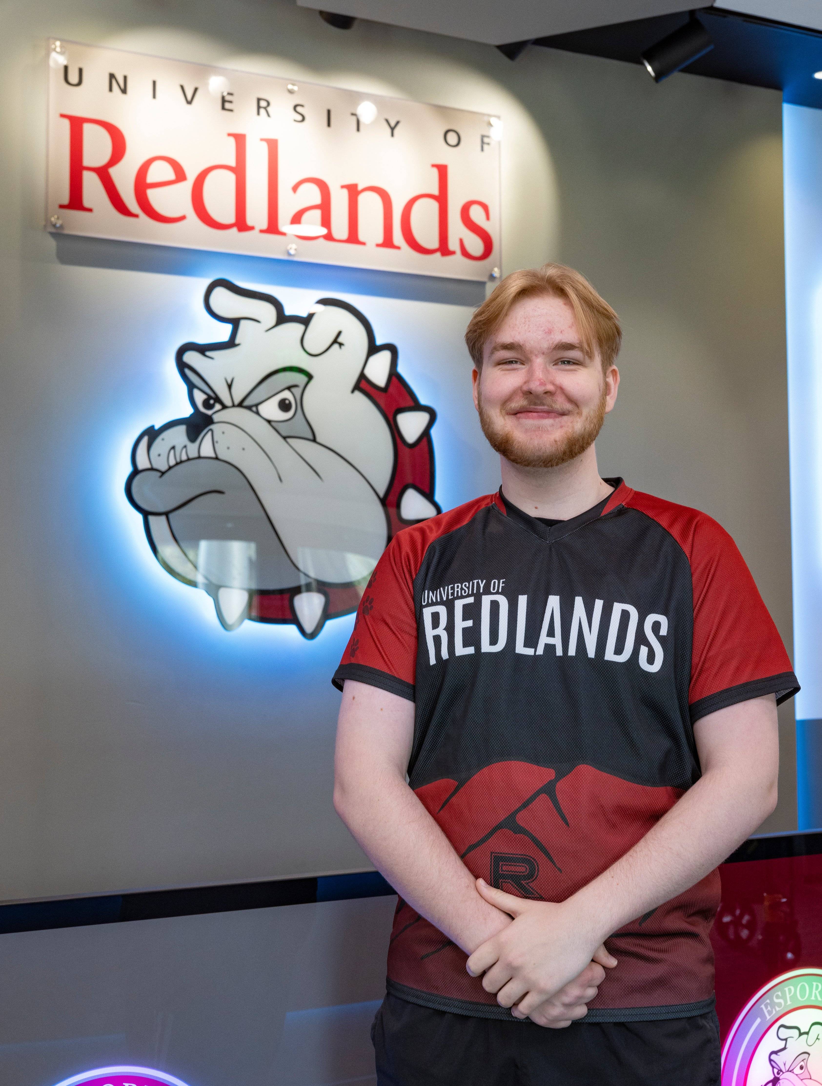 a person standing in front of a sign