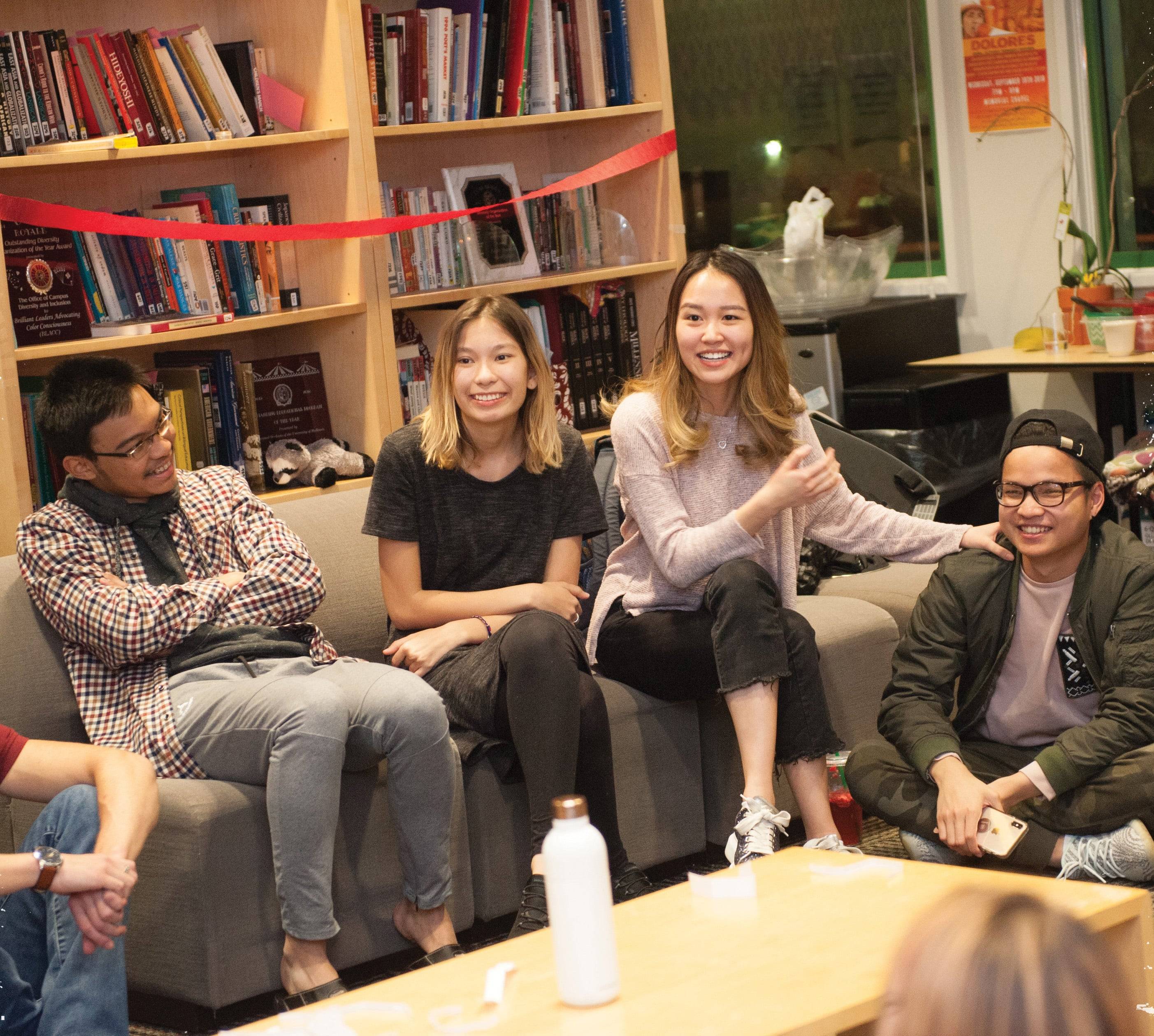 a group of people sitting on couches