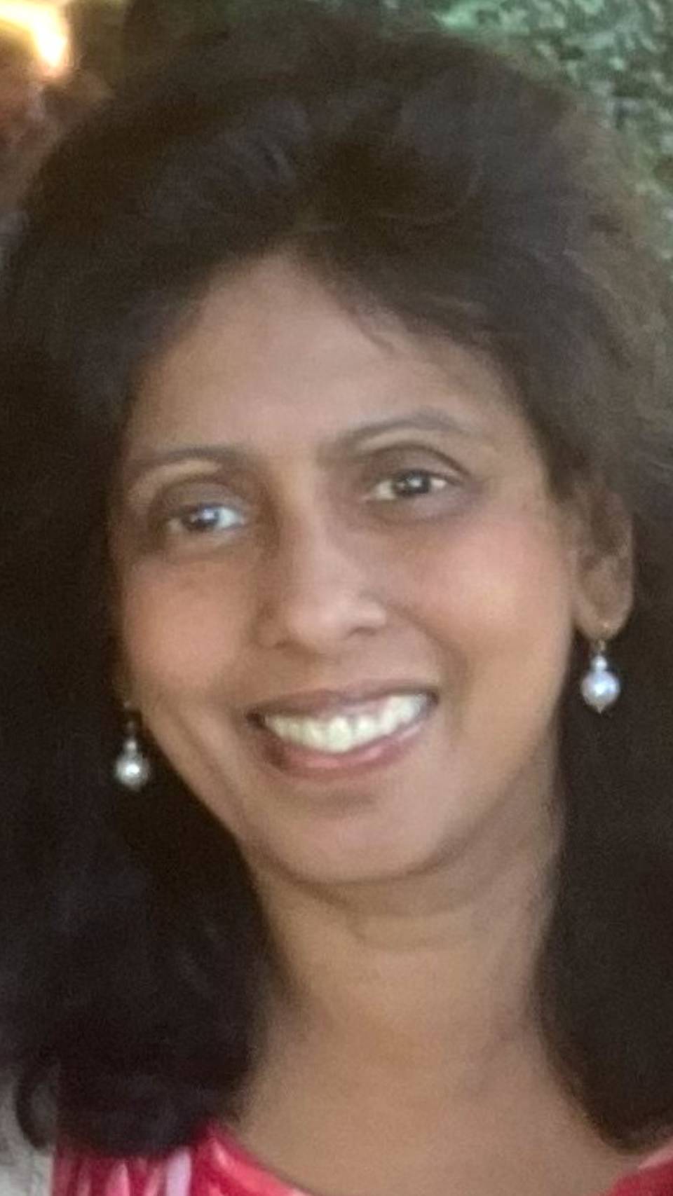 a person smiling at the camera