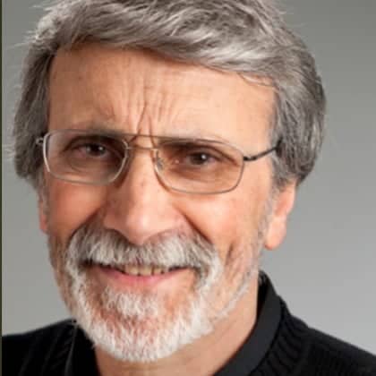 a person with glasses and a beard