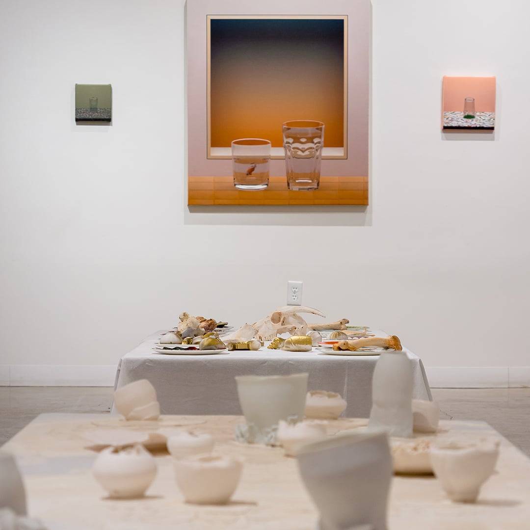 a table with broken dishes on it