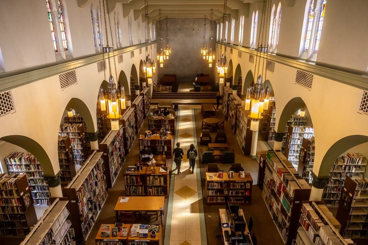 a group of people in a library