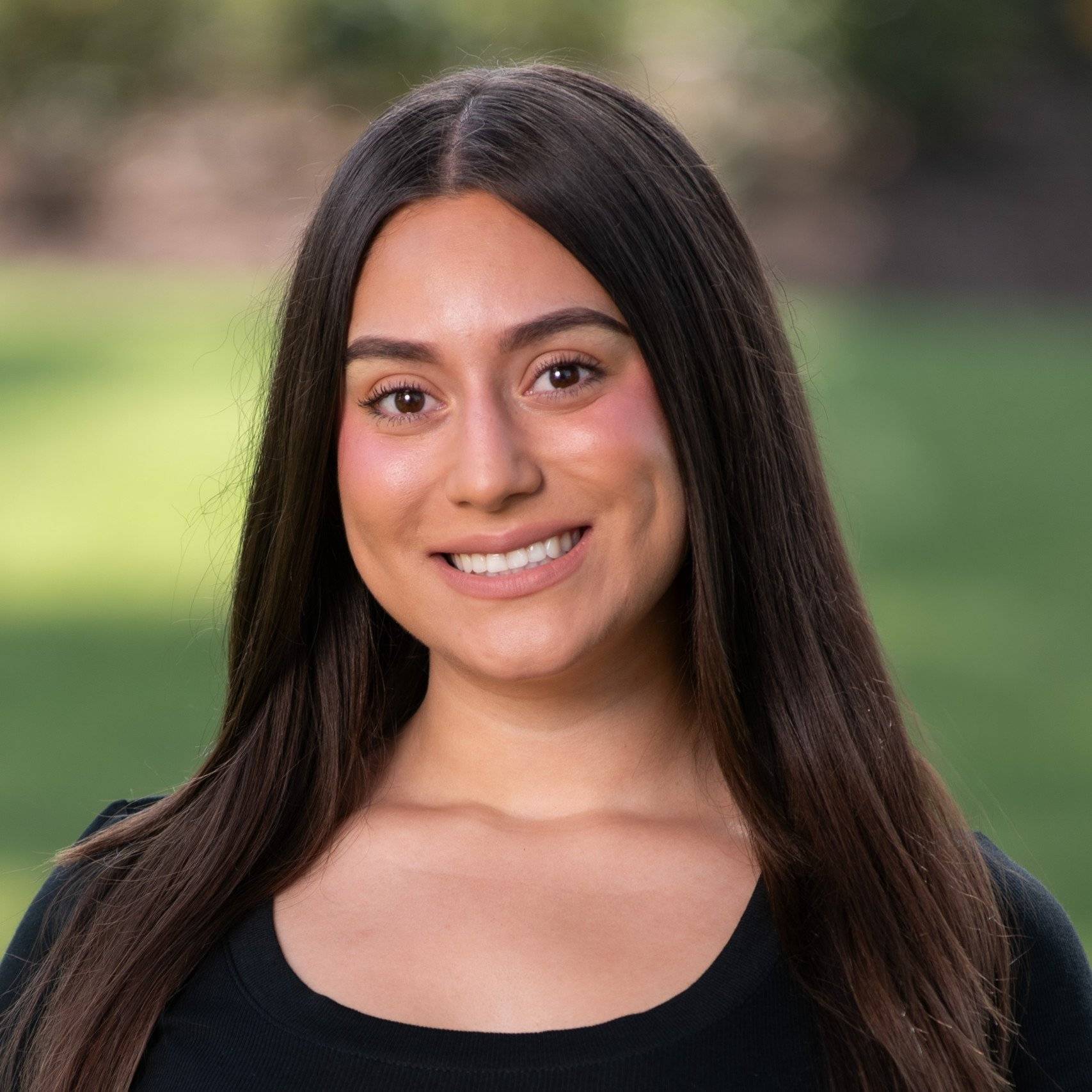 a person smiling at camera