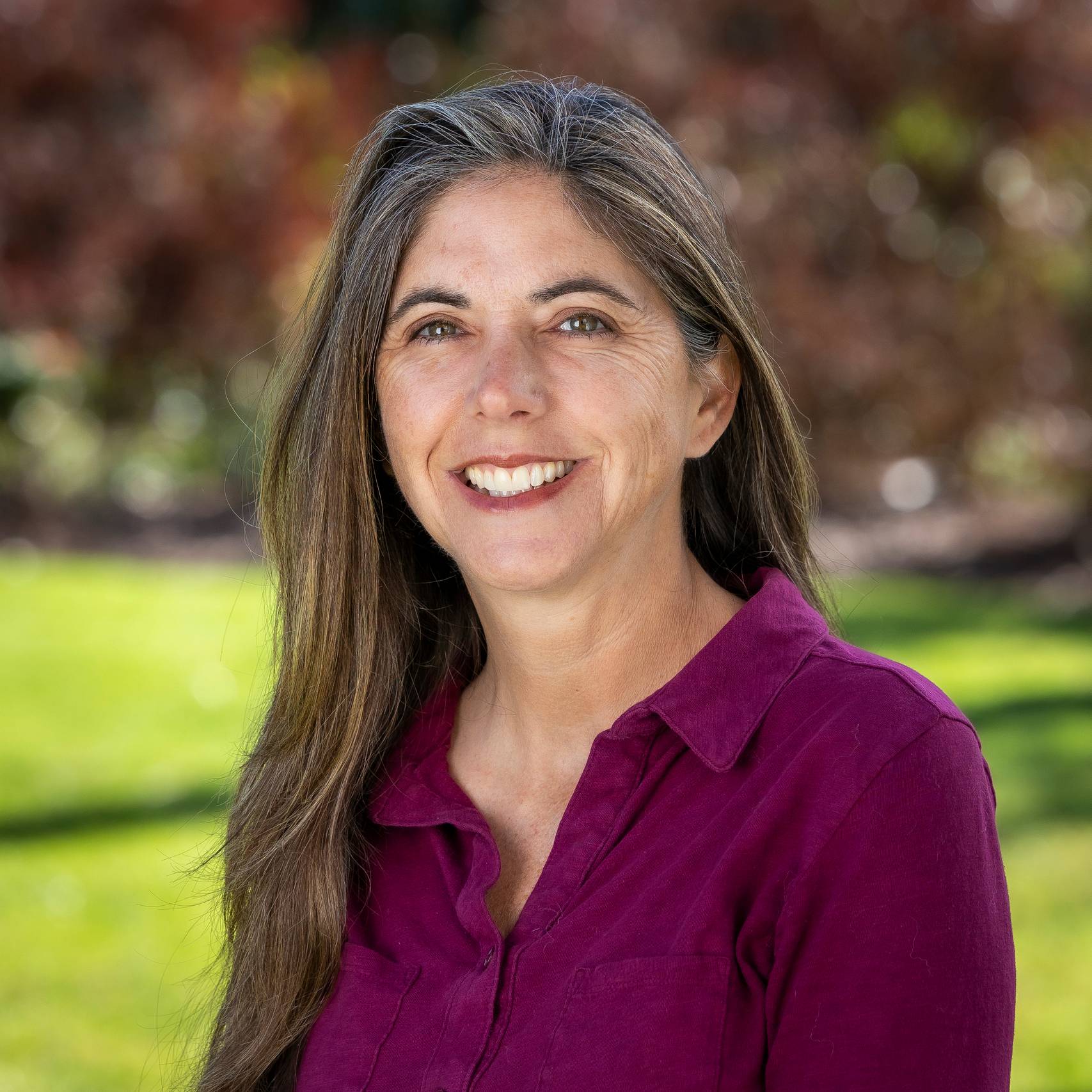 a person smiling at camera