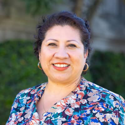 a person smiling at camera