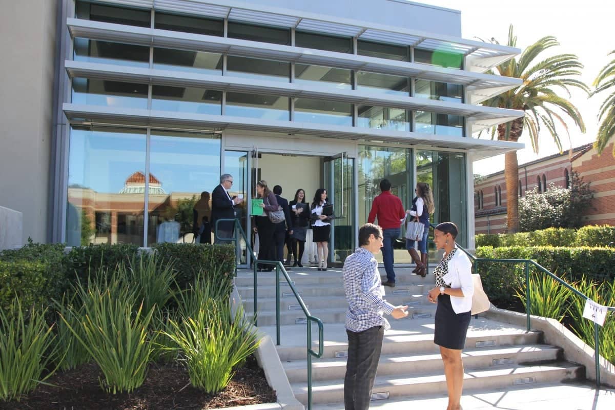 a group of people outside a building