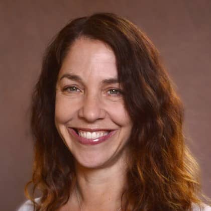 a person smiling at the camera