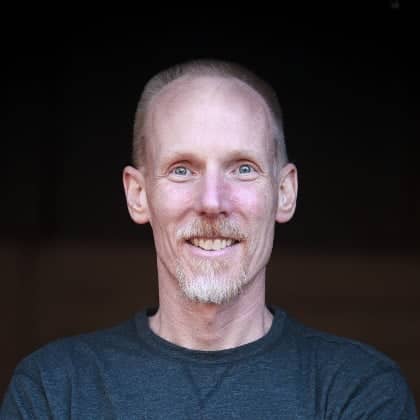 a person smiling for a picture