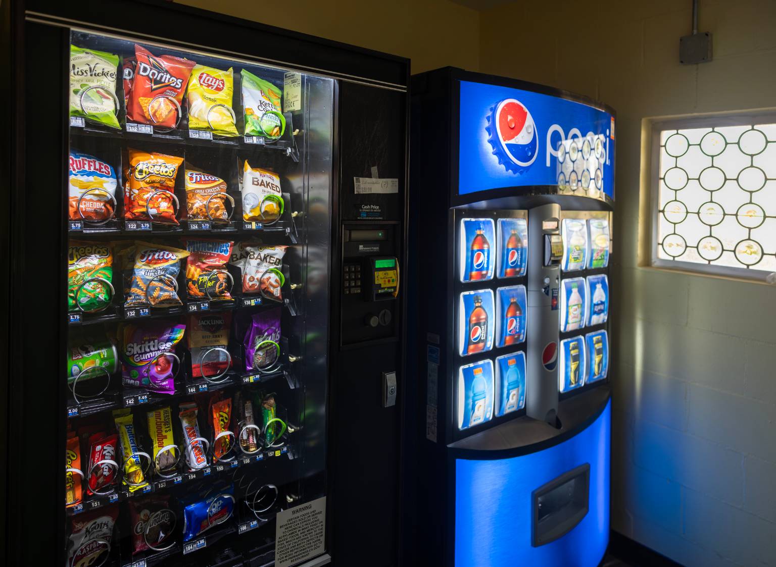 a vending machine with snacks in it