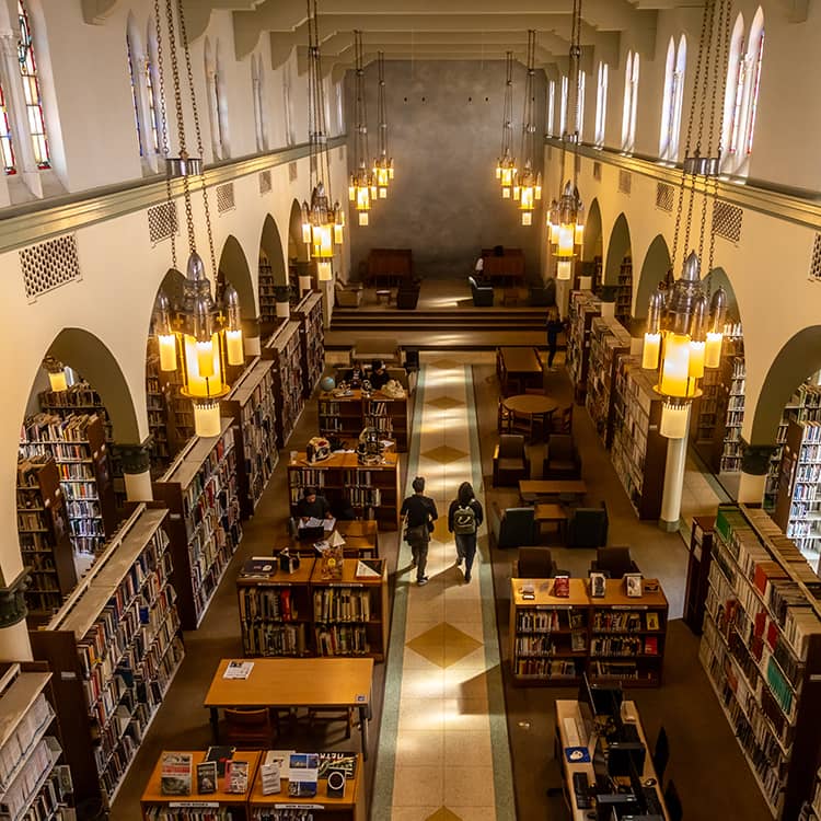 a large library with persony books
