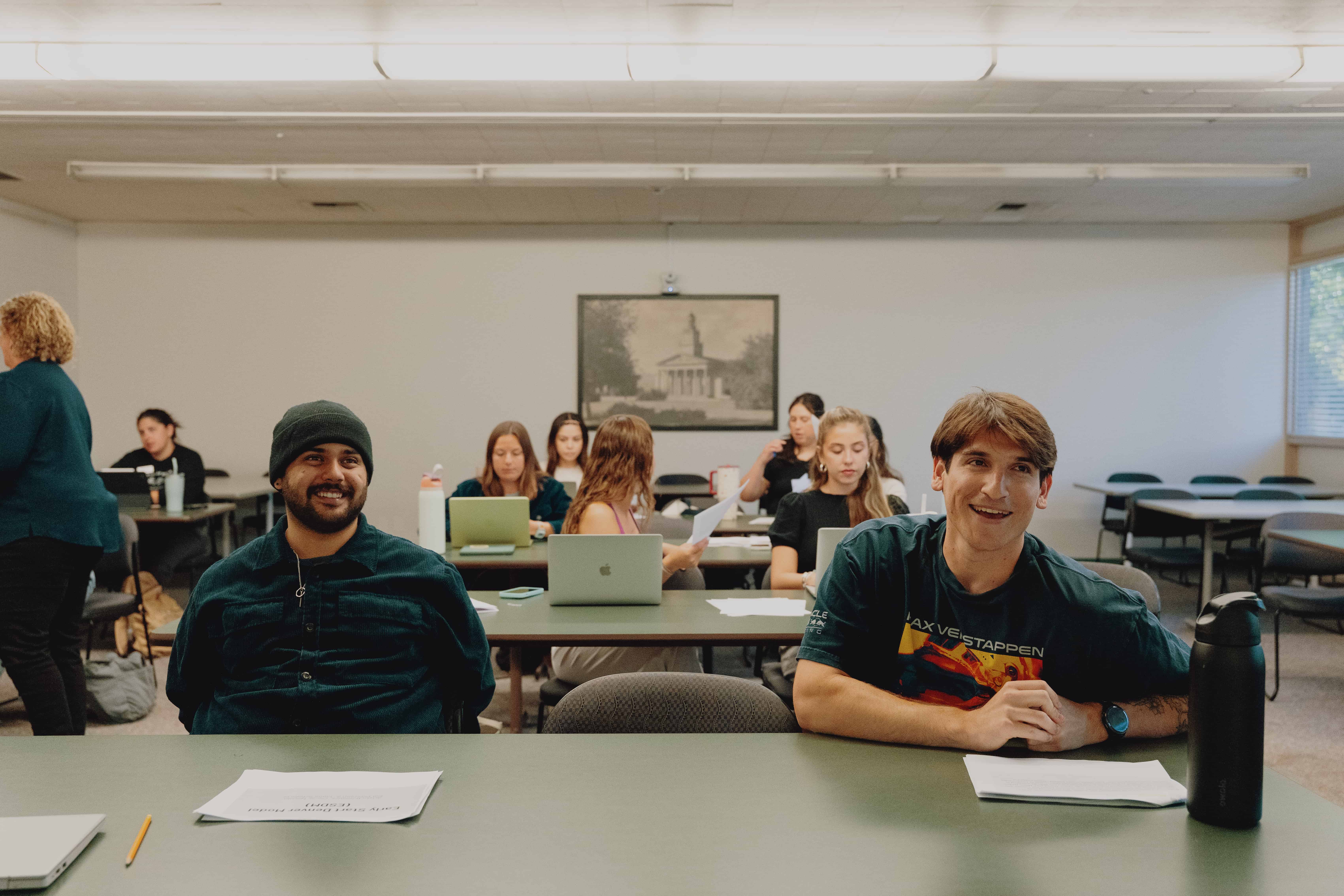 a group of people sitting at a table