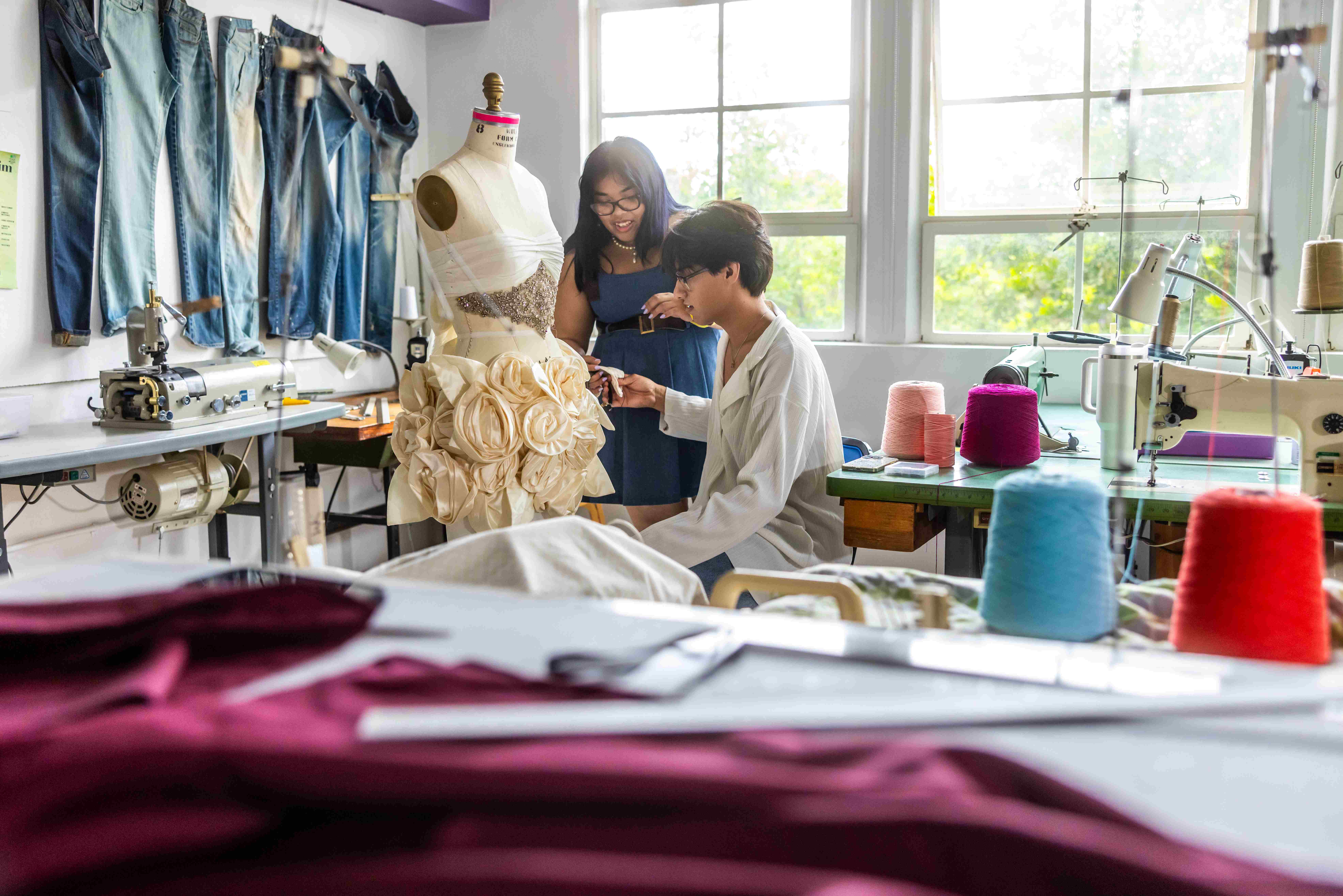 Fashion design students working on a project.