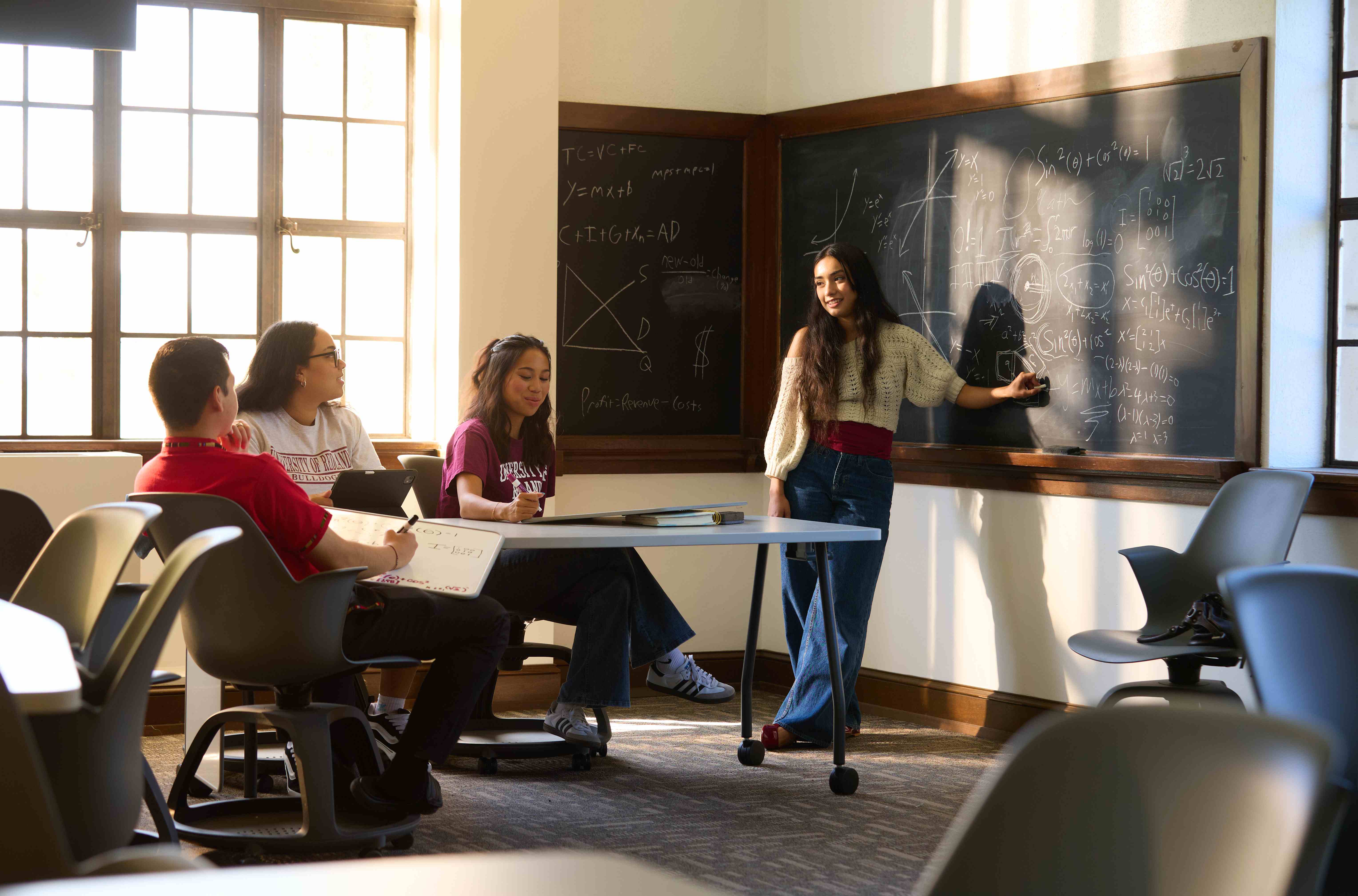 Undergraduate students learning together in Hall of Letters on Redlands campus.