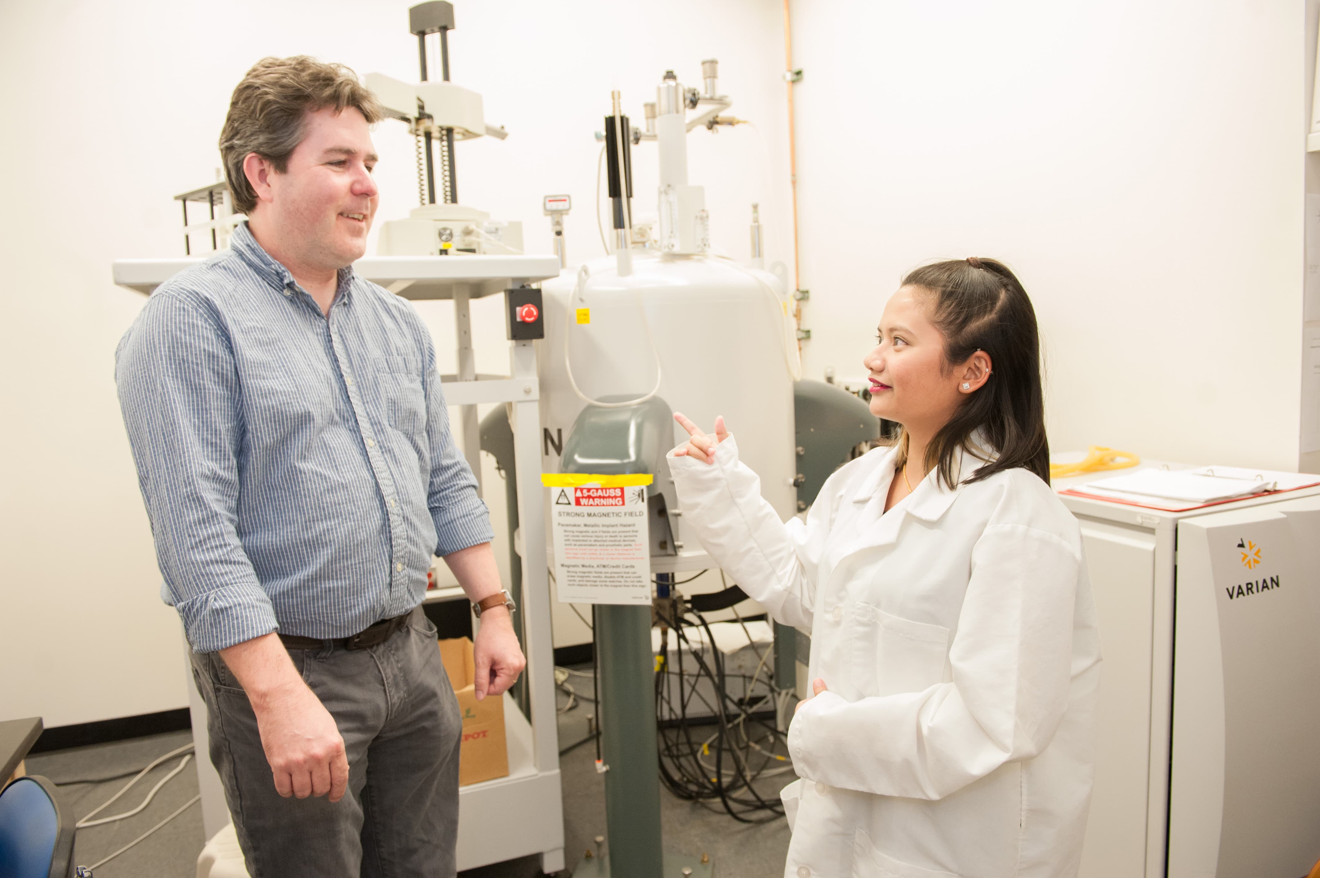 a person and person in lab coats