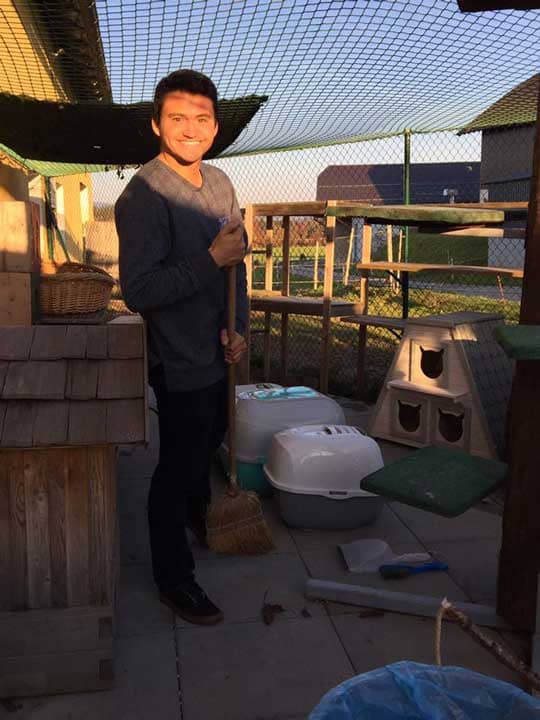 a person holding a broom