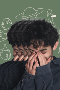 a group of men with their hands covering their face