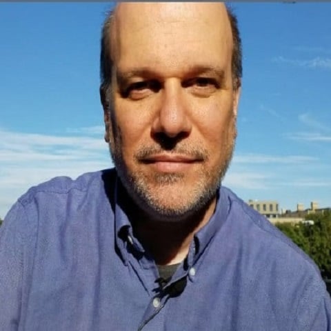 a man in a blue shirt