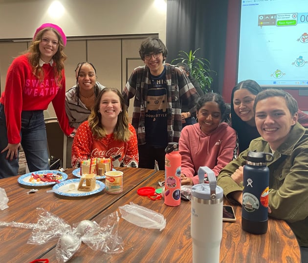 a group of people around a table