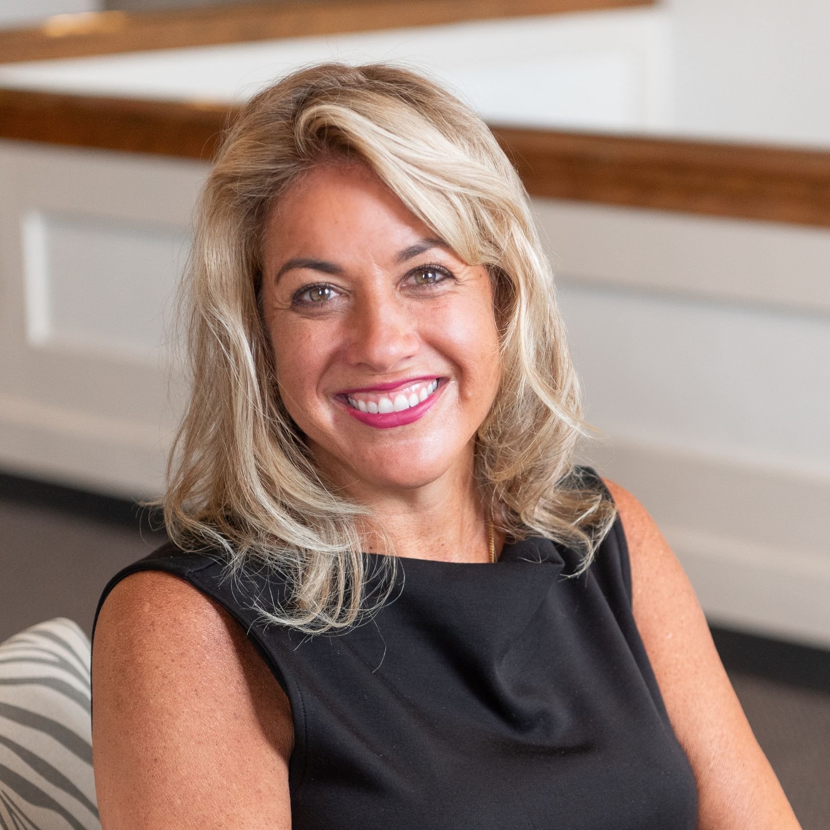 a woman smiling at camera