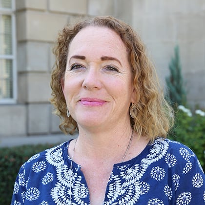 a woman smiling for a picture