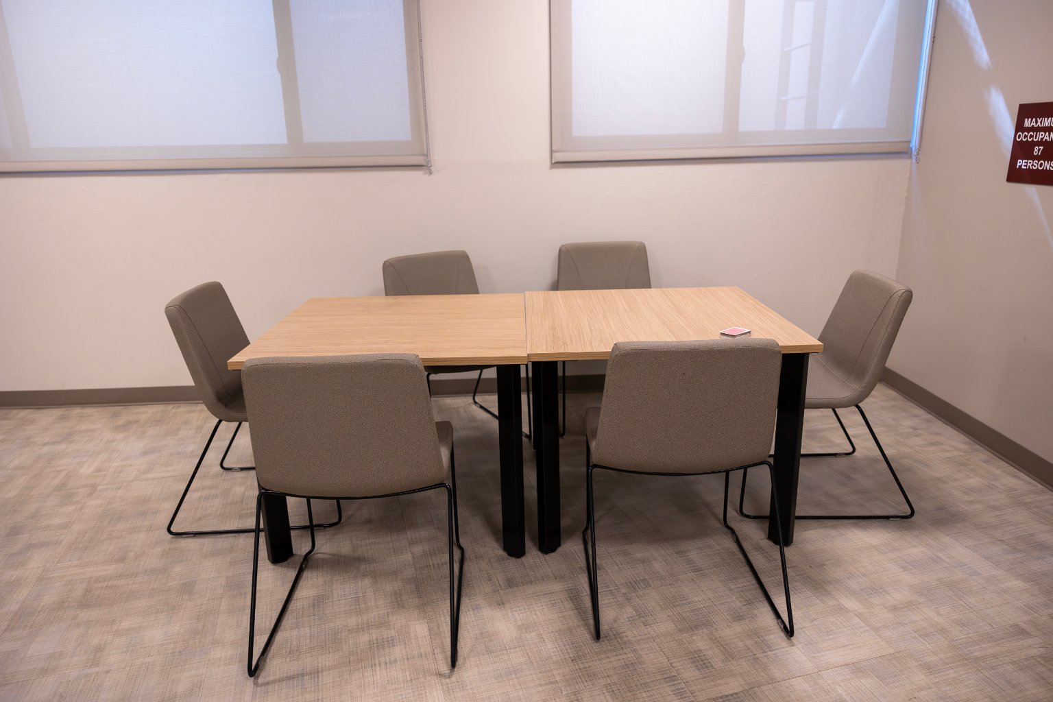 a table and chairs in a room