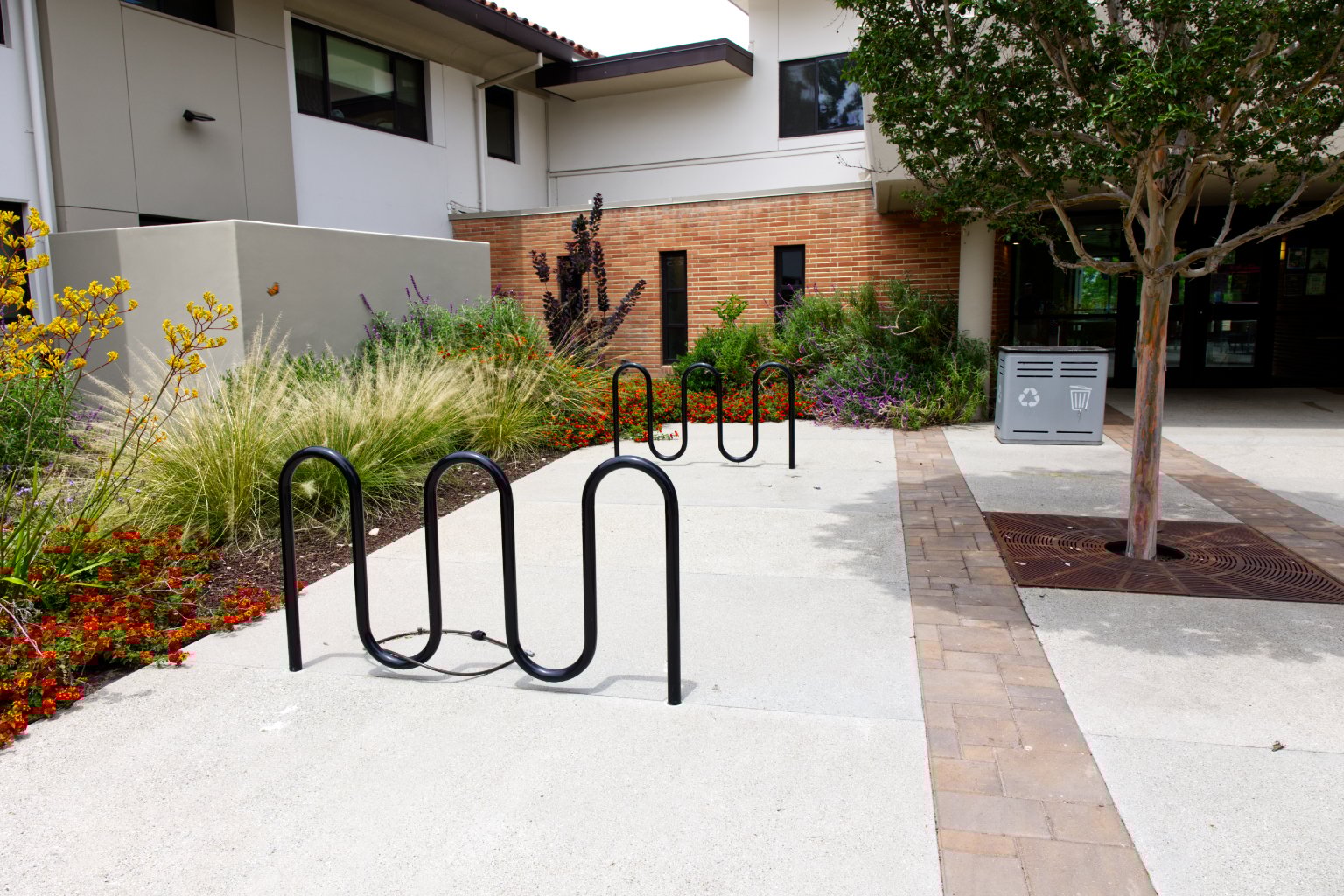 a bike rack in front of a building