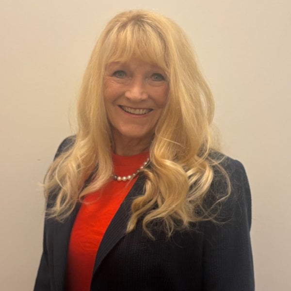 a woman smiling at camera