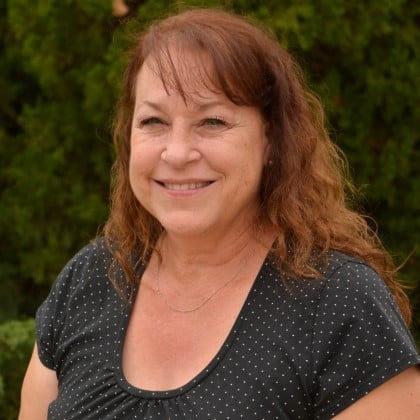 a person smiling at the camera