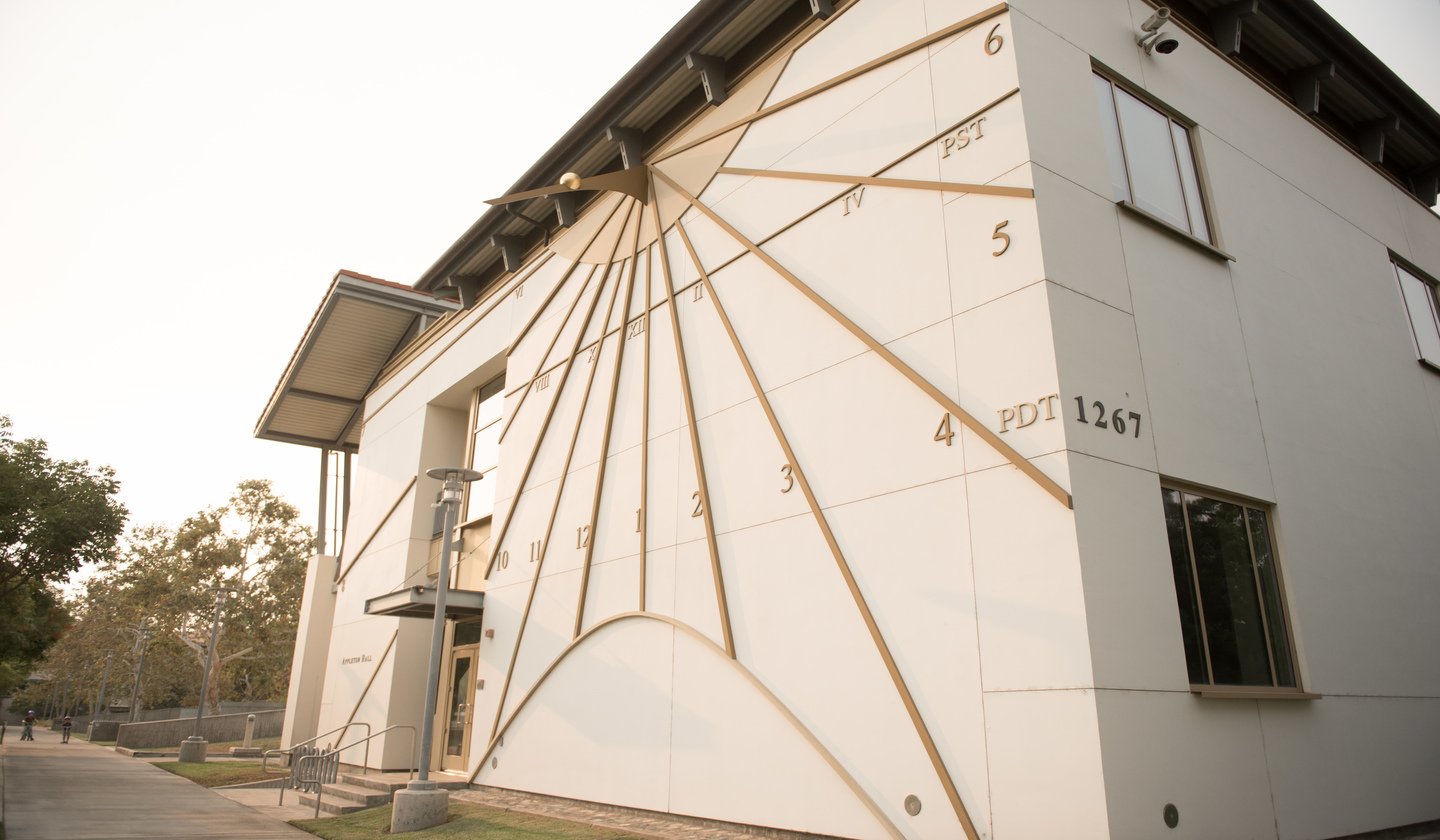 a sundial on a building