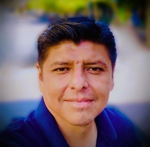 a man smiling for the camera