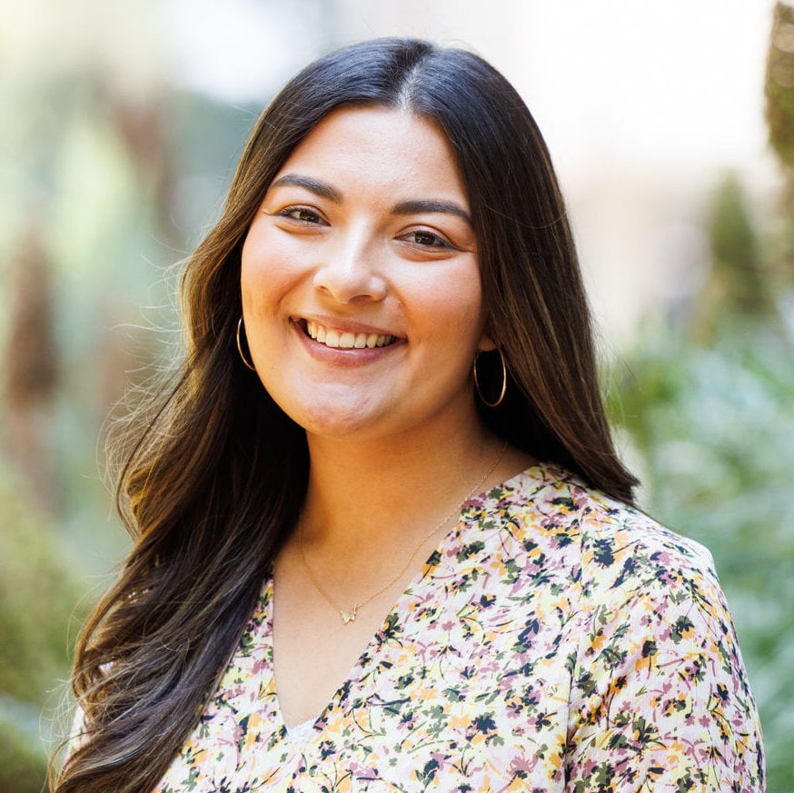 a woman smiling at camera