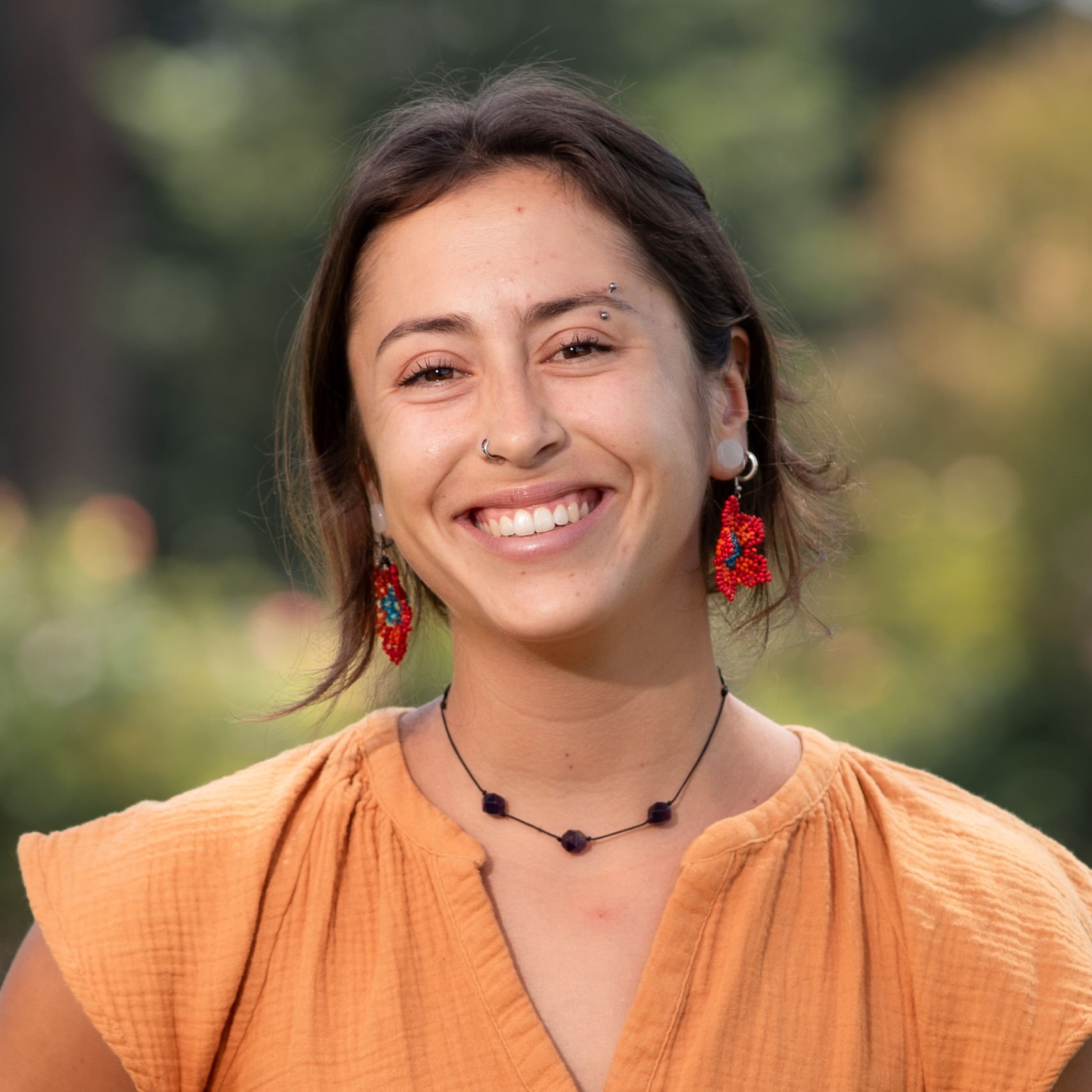 a woman smiling at camera