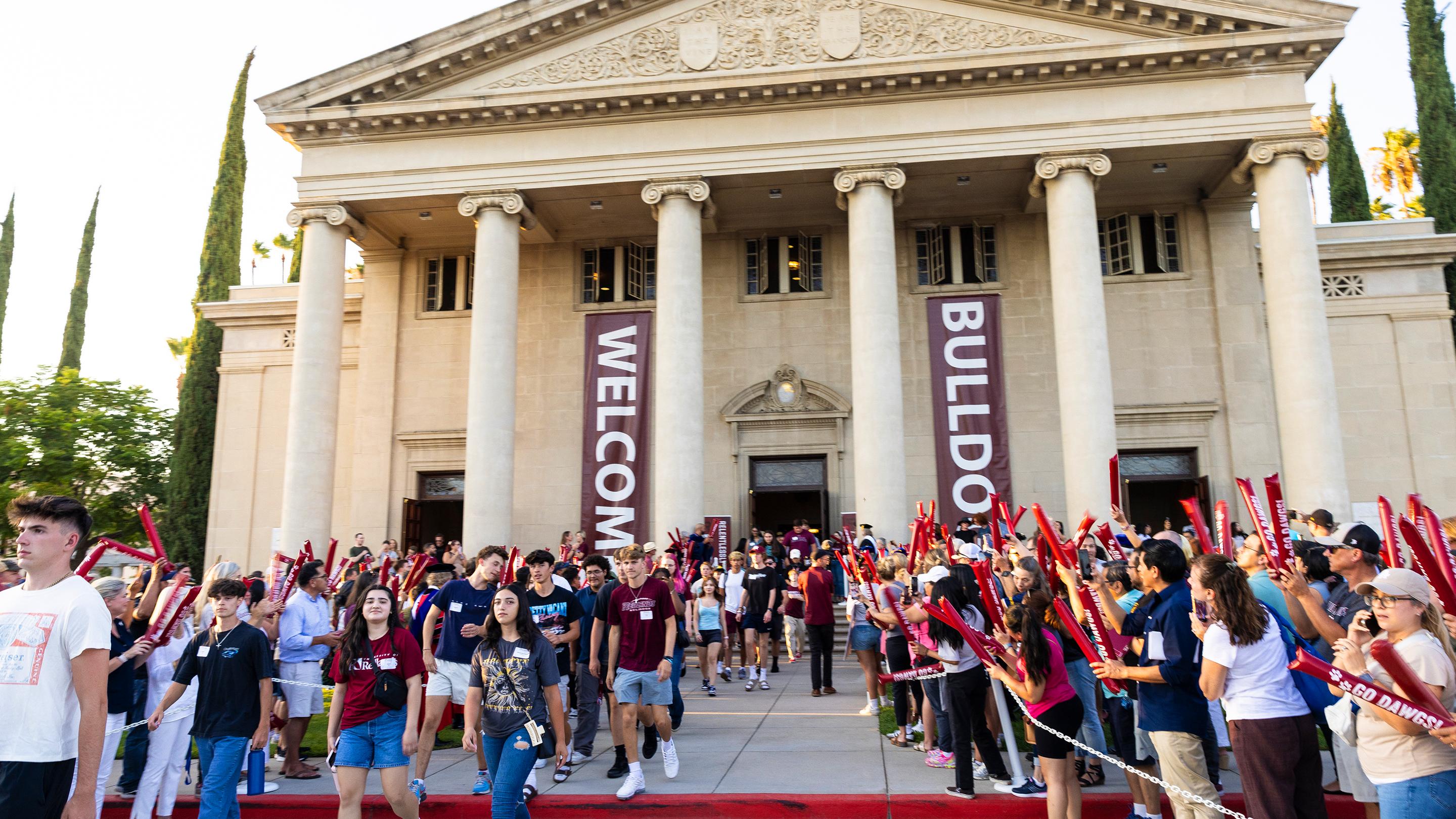 a group of people outside a building