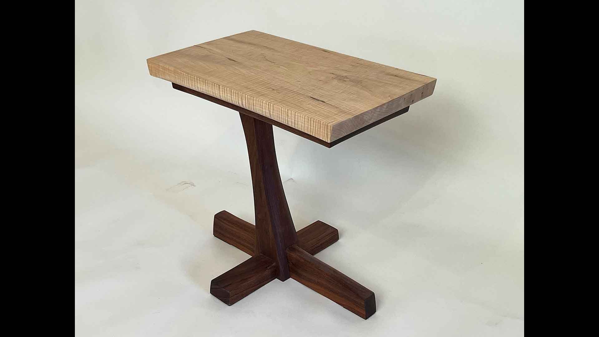 a wooden table with a white background