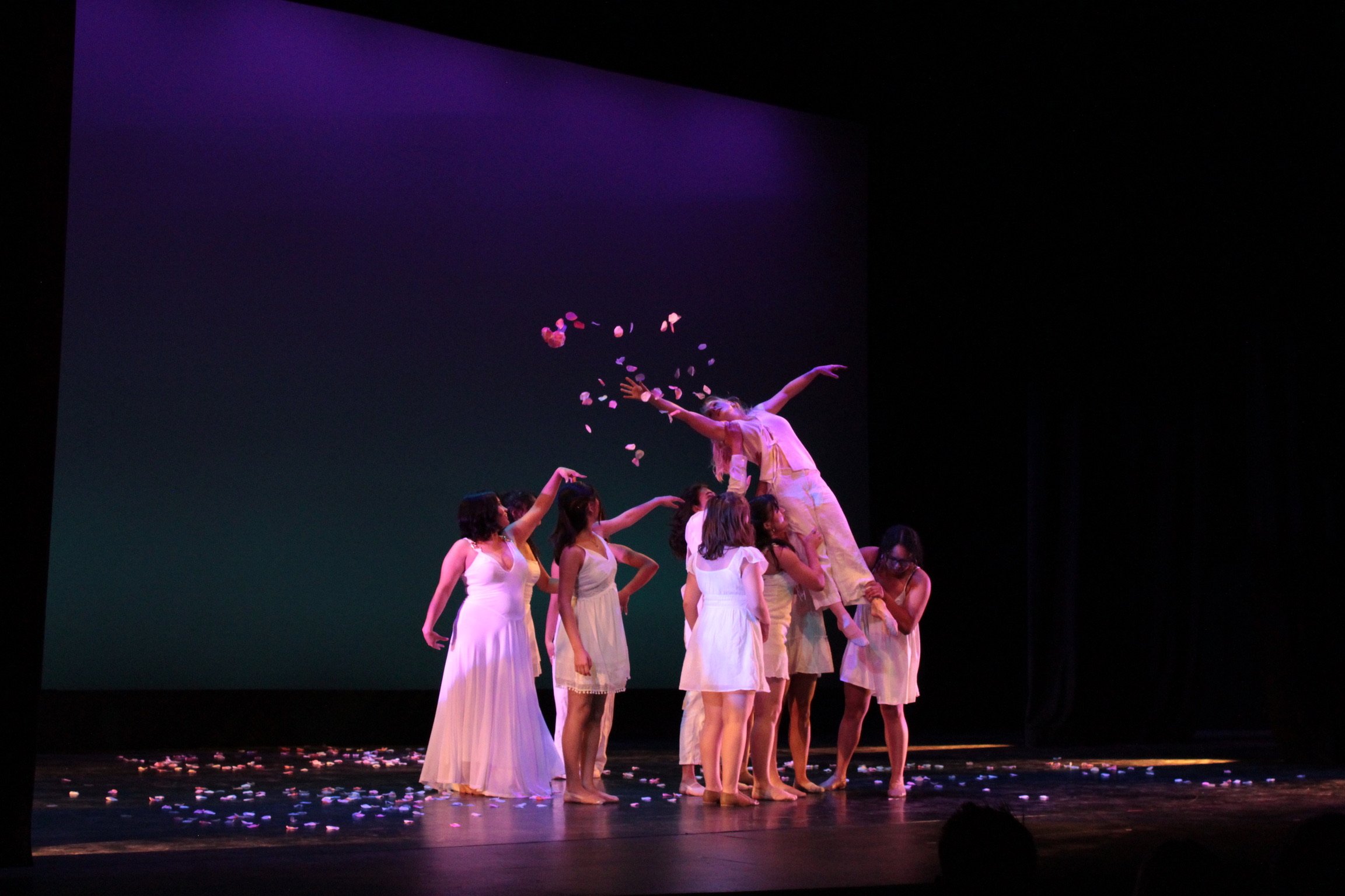 a group of women on a stage