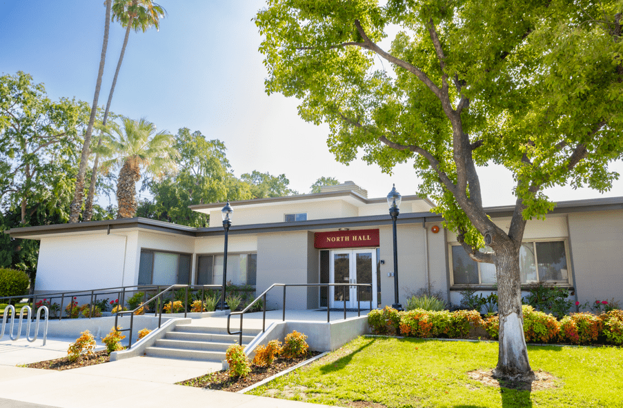 a building with stairs and steps leading to the entrance