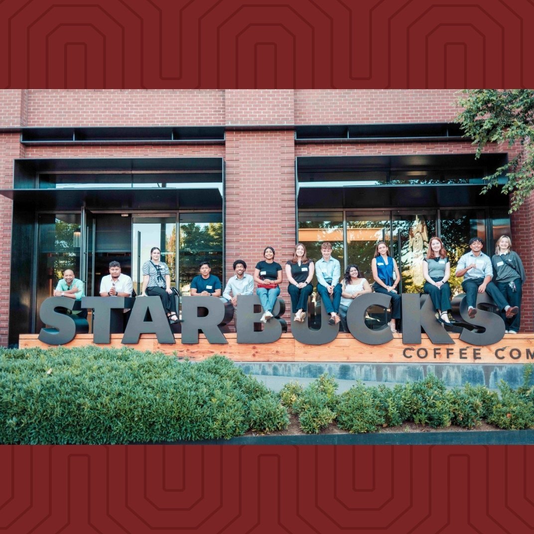 a group of people posing for a photo